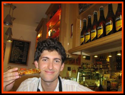 Enjoying pizza in Lyon, France (2008)